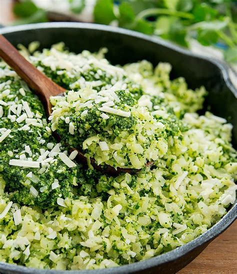 Consider grabbing a bag of frozen cauliflower rice from the freezer to whip up a simple lunch or dinner in minutes! Pesto Cauliflower Rice - Kirbie's Cravings