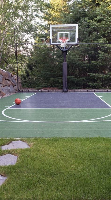 College basketball court designs are trending toward geography. Backyard Basketball Court - Paradise Restored Landscaping | Basketball court backyard, Backyard ...