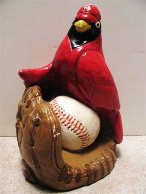 Carved from a solid piece of wood, this magnificent polychrome statue of a catholic cardinal is an exquisite example of the carver's art. Lot Detail - 60's ST. LOUIS CARDINAL MASCOT STATUE
