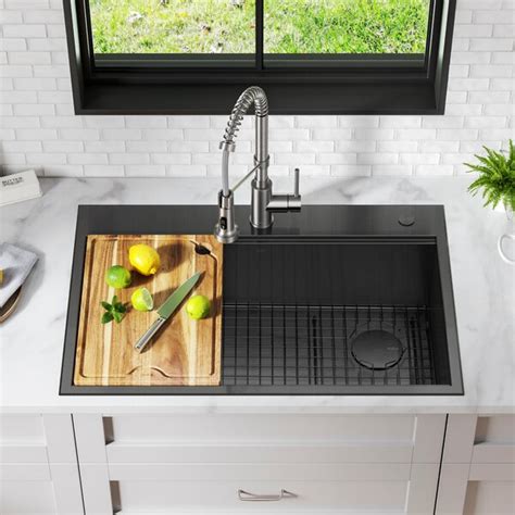 I'm looking to replace our current stainless steel under mount kitchen sink with a drop in cast iron. Kraus Kore Workstation 33" L x 22" W Drop-In Kitchen Sink ...