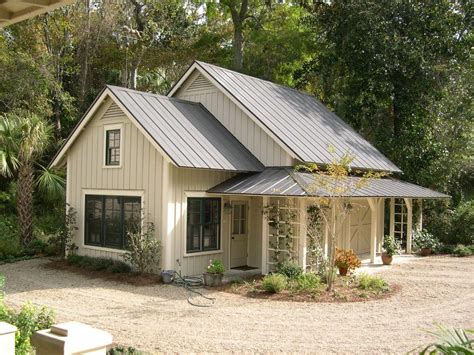 Farmhouse Roof Exterior Farmhouse With Garage Doors Standing Seam Metal