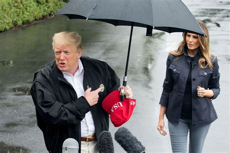 donald trump leaves wife melania out in the rain while he uses an umbrella — see the photos