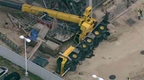 Large Crane Falls Over At Building Under Construction In West