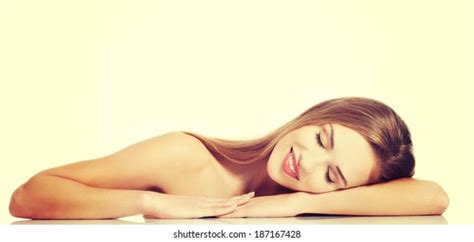 Beautiful Caucasian Naked Woman Lying On Stock Photo