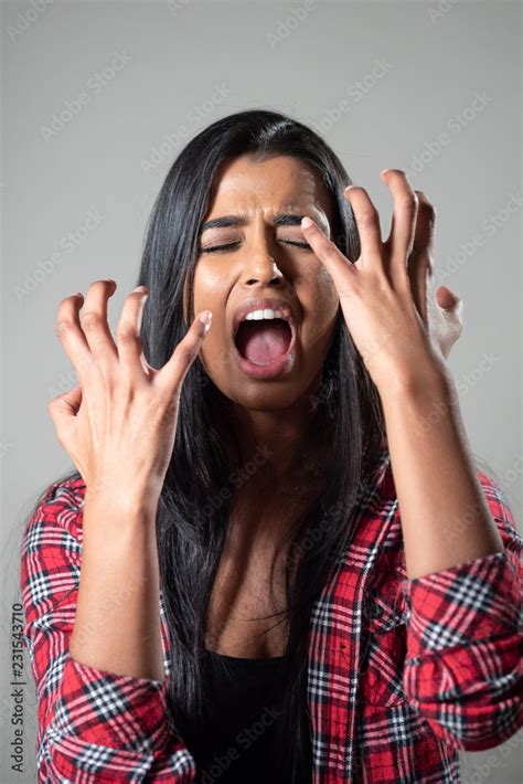 Ethnic Woman Screaming Crying In Panic Studio Portrait Stock Photo Adobe Stock