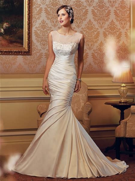 Trying mermaid gown wedding dresses, you often meet different facets for an upper and a lower body. Mermaid Illusion Neckline Ruched Satin Embroidered Wedding ...