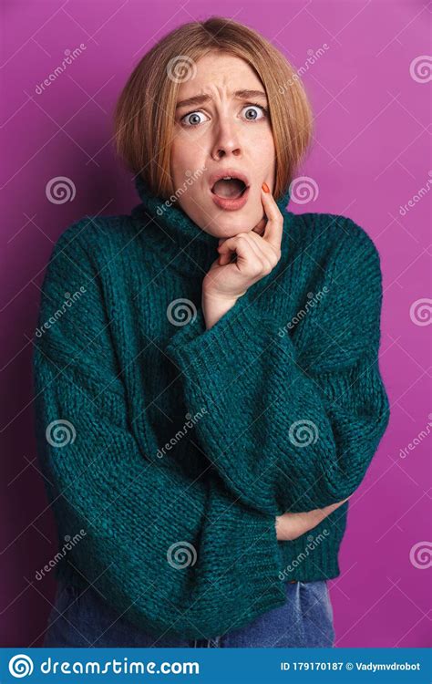 Photo Of Shocked Woman Expressing Surprise And Looking At Camera Stock