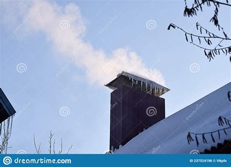 Smoke Raising From A Chimney In Winter Stock Photo Image Of Energy