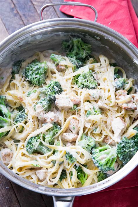 Top chicken, broccoli and pasta with a spicy peanut sauce. Chicken and Broccoli Alfredo | LemonsforLulu.com