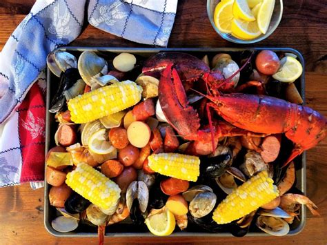It's best to have items that guests can eat with their hands or while standing. One Pot Clambake Served on Large Platter (With images ...