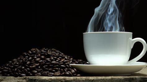 Coffee bean with smoke Stock Video Footage - Storyblocks