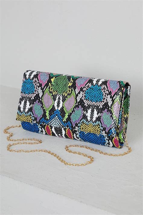 This Clutch Is A Multi Color Faux Snakeskin Bag Features Gold Hardware