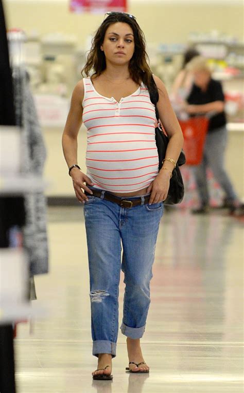 pregnant mila kunis goes shopping as ashton kutcher tweets a nesting picture from set e news