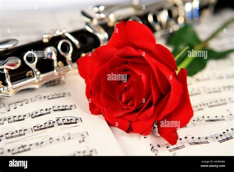 Clarinet With Red Rose On Sheet Music Stock Photo Alamy