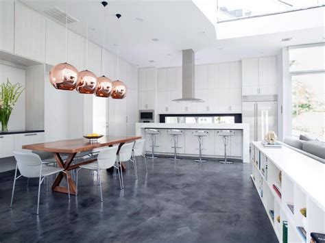 A Refinished Concrete Floor And Whitewashed Cabinets Add To The Cool
