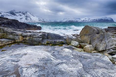Roaring Ocean Near Rocky Shore Of Picturesque Lofoten Islands In Norway