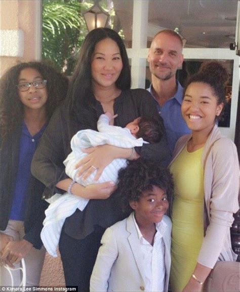 Kimora Lee Simmons And Tim Leissner Take Son Wolfe For A Stroll