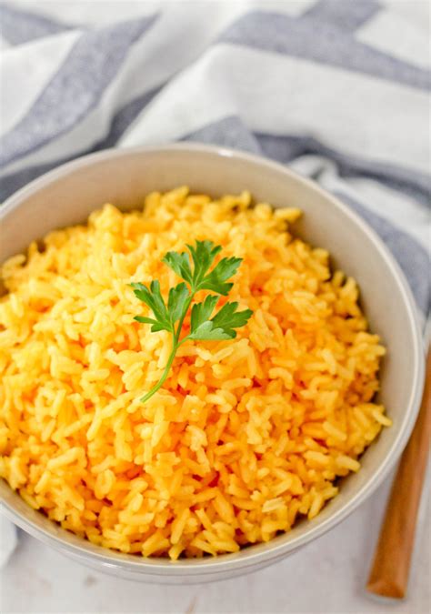 Combine the rice, raisins, cloves, salt, turmeric, ginger and water in a medium saucepan. Yellow Rice (1 of 1)-5 - Jehan Can Cook