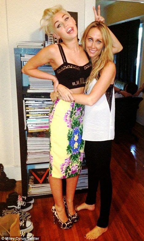 racy miley cyrus wears bralet as she shares a hug with skinny mother tish cyrus in new twitter