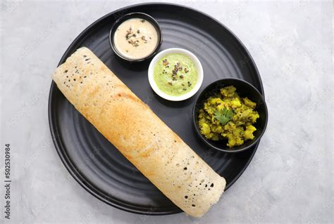 Crispy Masala Dosa Is A Popular South Indian Food Item Served With Tomato Chutney Coconut