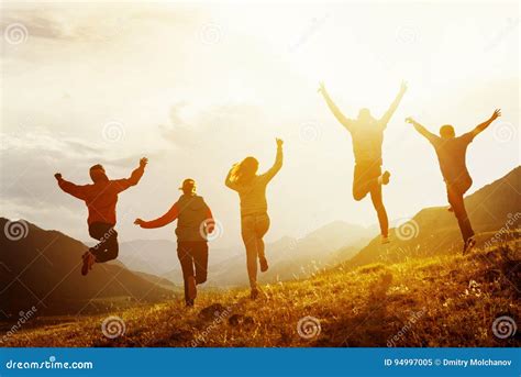Group Of Happy Friends Run And Jump Stock Image Image Of Mountain