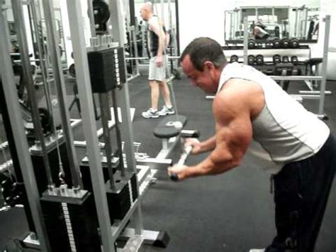 Check out this homemade diy cable pully machine. reverse tricep pulldowns - YouTube