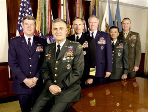 the joint chiefs of staff photographed in the joint chiefs of staff gold room standing