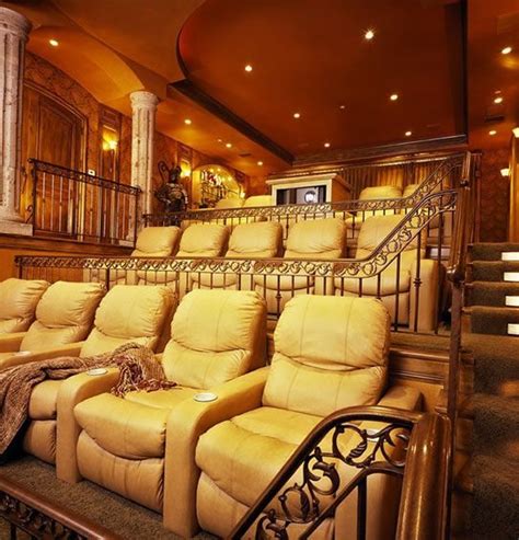 Dramatically Tiered Home Theater With Iron And Brass Railings Home