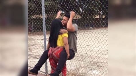 Girl Kissing Guy Against Fence Know Your Meme