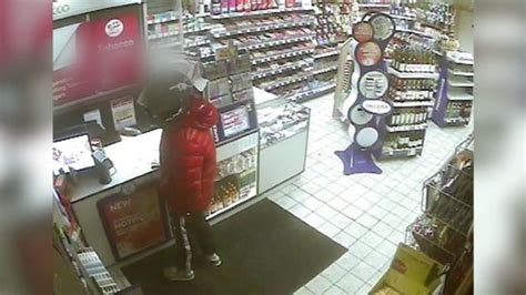Dramatic Cctv Shows Gun Wielding Robber Steal Cash And Cigarettes From Shop Assistant