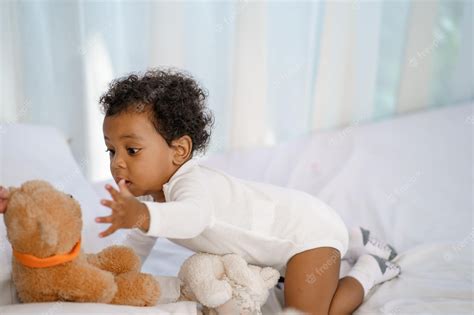 Premium Photo Happy African American Little Baby Boy Crawling And