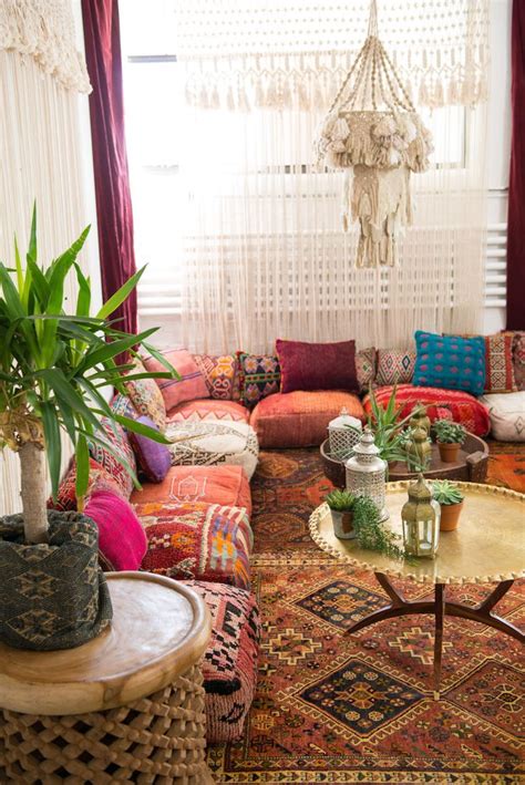 Moroccan Floor Pillows Lined Up Against A Corner Wall Paired With