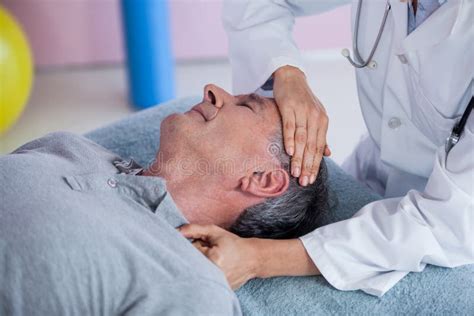 Senior Man Receiving Neck Massage From Physiotherapist Stock Image Image Of Healthcare Closed