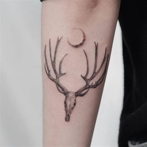 Deer Skull Tattoo Located On The Forearm
