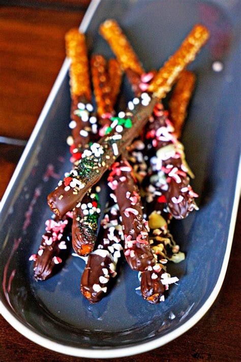 These yummy chocolate covered pretzel rods are super easy to make and share, and you and your kids will have a ton of fun making them! Holiday Chocolate Dipped Pretzels - Kevin Is Cooking