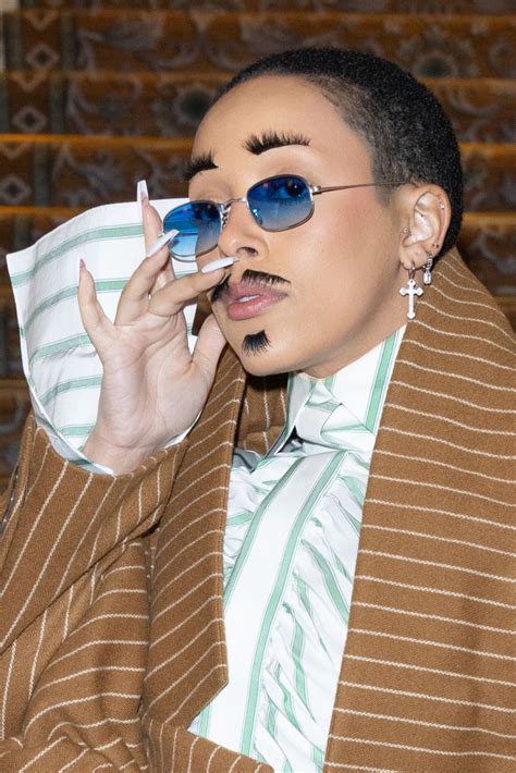 Doja Cat Turns Eyelashes Into Mustache And Soul Patch At Viktor And Rolf