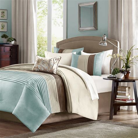 I have a collage put together that lets you choose different matching fabrics in the items you want (just send me a note at checkout letting me know what letter fabric and for what. Light Blue and Brown Bedding & Comforter Sets
