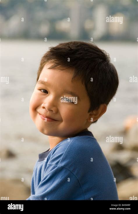 A Smiling Young Boy At The Beach In Vancouver Canada Stock Photo Alamy