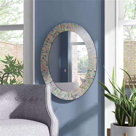 If you are opting for an understated look you may wish to go for one of our triple black glass framed mirrors these offer elegant sleek lines that will add a decorative flair to any wall. Ebern Designs Bohemian Rainbow Rhapsody Wall Mirror -Glass ...