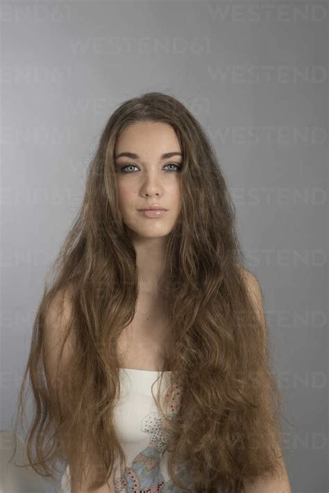 Portrait Of Teenage Girl With Long Brown Hair Stockphoto