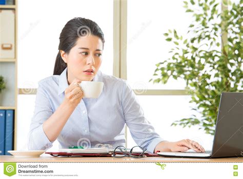 Young Asian Business Woman Overworked With Uncomfortable Stock Image
