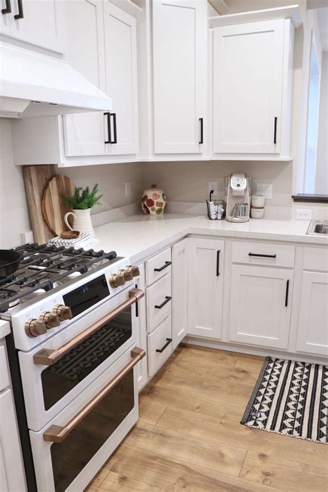Cabinets made from the most premium hardwood. We love GE's new cafe line in matte white for our kitchen ...