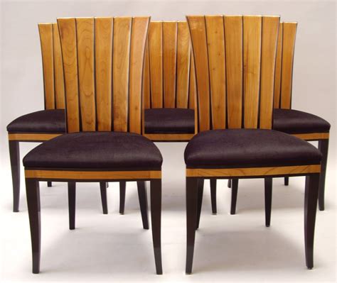 Saarinen har formgivit en rad möbler och inredningsförslag i eleganta, strama former. TEN Dining Chairs designed by Eliel Saarinen at 1stdibs