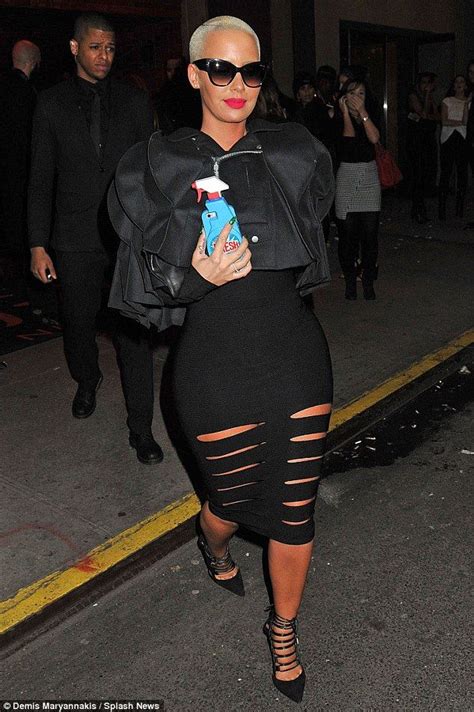 Amber Rose Flaunts Her Famous Curves In Racy Thigh Slashed Mini Dress