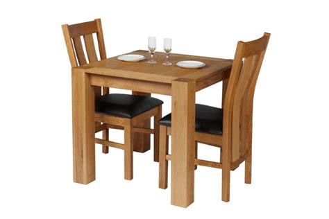 Distinguish you home with beautiful table and chair sets that are equally attractive with or without food being served; Cambridge 2 Seater Oak Table Leather Chair Set