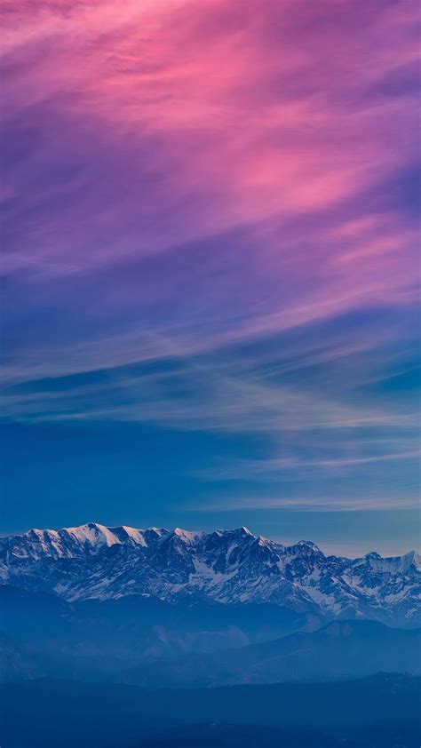 White Green Covered Mountains Under Blue Sky 4k Hd Guy Blue Sweater