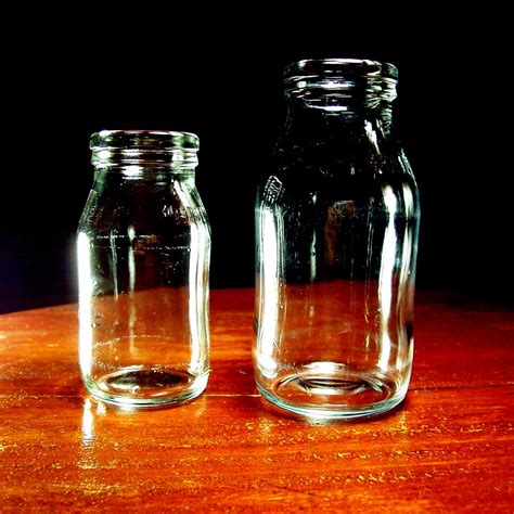 Similar Figures Or Two Bottles On A Round Table Sognihal Flickr