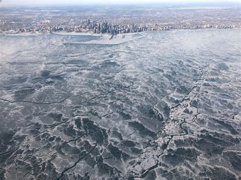 Shocking Photo Shows Lake Michigan Completely Frozen Over