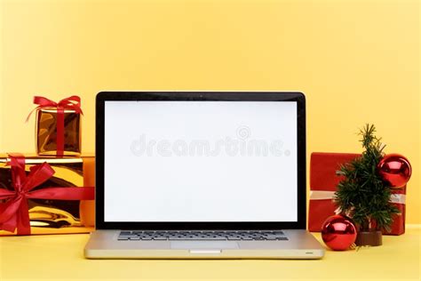 Santa Claus Using Laptop Computer Mock Up White Screen Sitting At Table