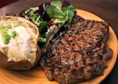 Have Her Over For Dinner Grilled Ribeye Steaks With Sour Cream And Chive Potatoes And Blue